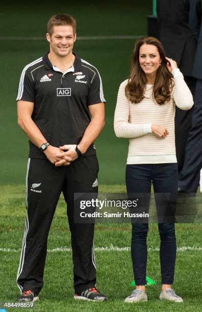 Catherine, Duchess of Cambridge and All Blacks captain Richie McCaw attend a young players' Rugby tournament at Forsyth Barr Stadium on April 13,...