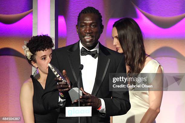 Director Malika Zouhali-Worrall, actor John "Long Jones" Abdallah Wambere and filmmaker Katherine Fairfax Wright accept an award onstage during the...