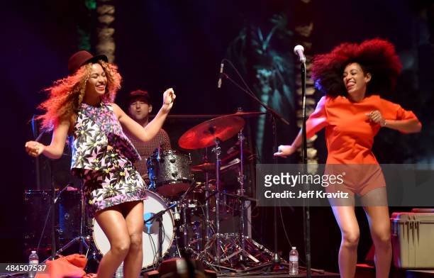 Singer Beyonce performs with her sister Solange onstage during day 2 of the 2014 Coachella Valley Music & Arts Festival at the Empire Polo Club on...