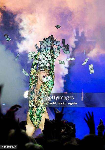 Miley Cyrus performs during her Bangerz Tour at The Palace of Auburn Hills on April 12, 2014 in Auburn Hills, Michigan.