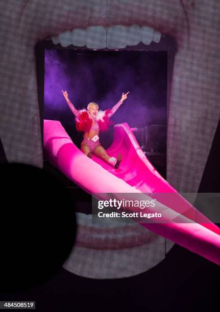 Miley Cyrus performs during her Bangerz Tour at The Palace of Auburn Hills on April 12, 2014 in Auburn Hills, Michigan.