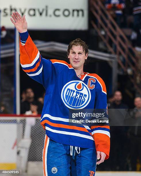 Ryan Smyth of the Edmonton Oilers salutes the crowd after his last NHL game after defeating the Vancouver Canucks at Rexall Place on April 12, 2014...