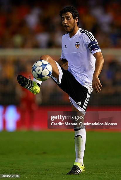Daniel Parejo of Valencia controls the ball during the UEFA Champions League Qualifying Round Play Off First Leg match between Valencia CF and AS...