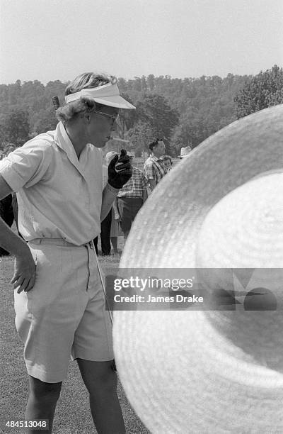 Women's Open: View of Mickey Wright smoking cigarette during Saturday play at Baltusrol GC. Springfield, NJ 7/1/1961 CREDIT: James Drake