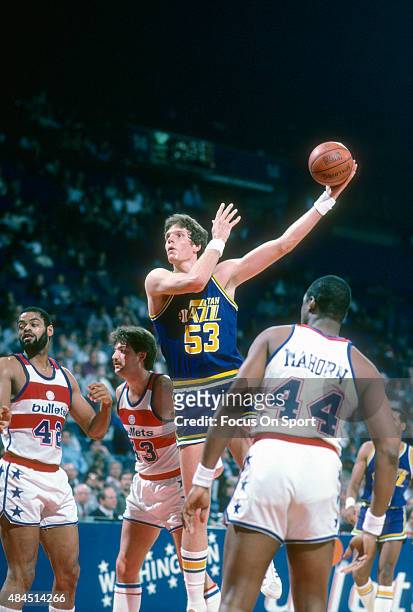Mark Eaton of the Utah Jazz shoots against the Washington Bullets during an NBA basketball game circa 1984 at the Capital Centre in Landover,...