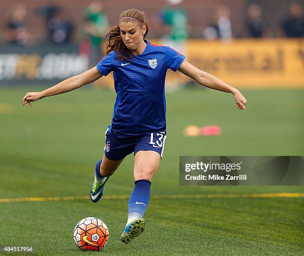 Forward Alex Morgan of the United States warms up before the friendly match against Costa Rica at Finley Stadium on August 19, 2015 in Chattanooga,...