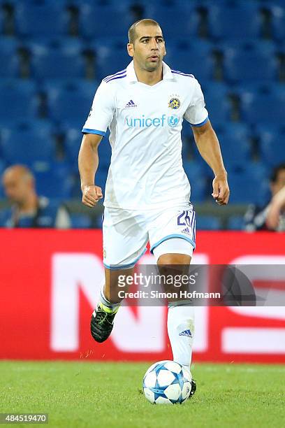 Tal Ben Haim of Tel Aviv controls the ball during the UEFA Champions League qualifying round play off first leg match between FC Basel and Maccabi...