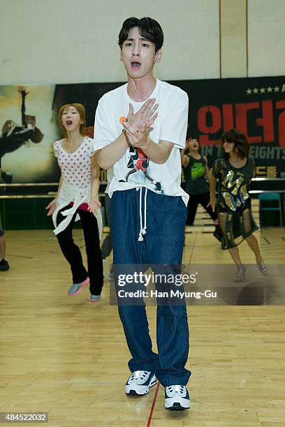 Actor Key of South Korean boy band SHINee performs during the press rehearsal for the musical "In The Heights" on August 19, 2015 in Seoul, South...