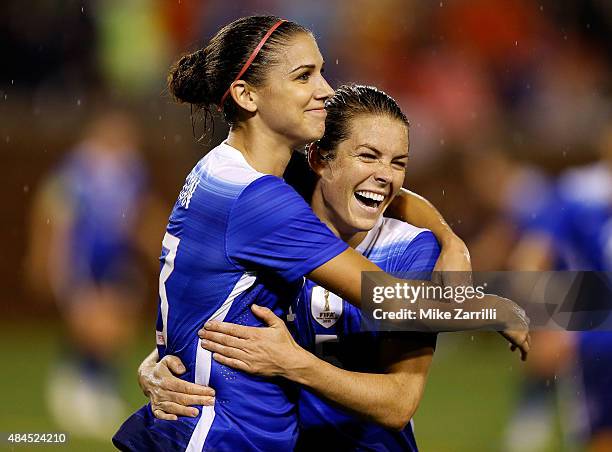 Forward Alex Morgan of the United States celebrates with defender Kelley O'Hara after Morgan's second half goal during the friendly match against...