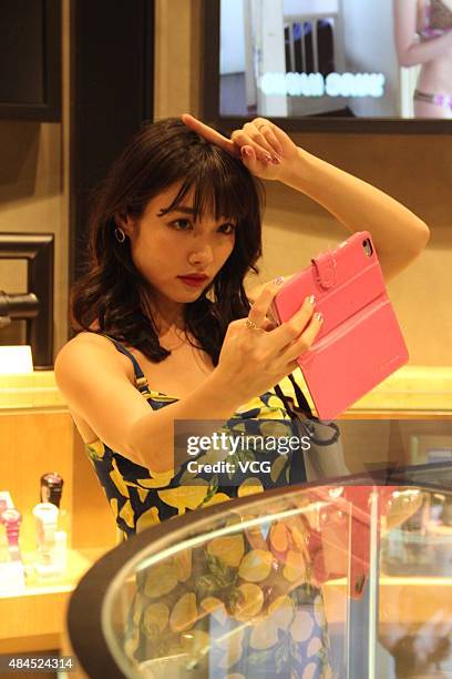 Anna Konno attends a photography exhibition at G-Shock Store Shanghai on August 19, 2015 in Shanghai, China.