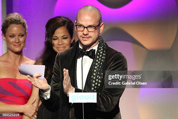 Actresses Teri Polo and Sherri Saum with Producer Peter Paige speak onstage during the 25th Annual GLAAD Media Awards at The Beverly Hilton Hotel on...