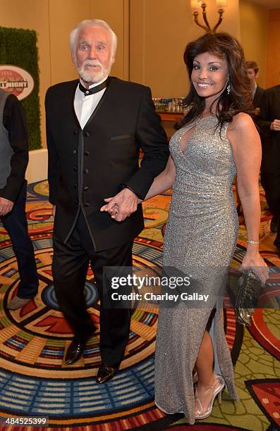 Singer Kenny Rogers and Wanda Miller attend Muhammad Ali's Celebrity Fight Night XX held at the JW Marriott Desert Ridge Resort & Spa on April 12,...