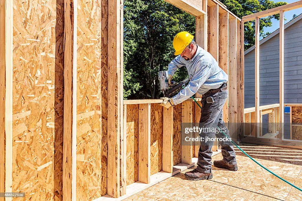 Construction Worker with Nail Gun