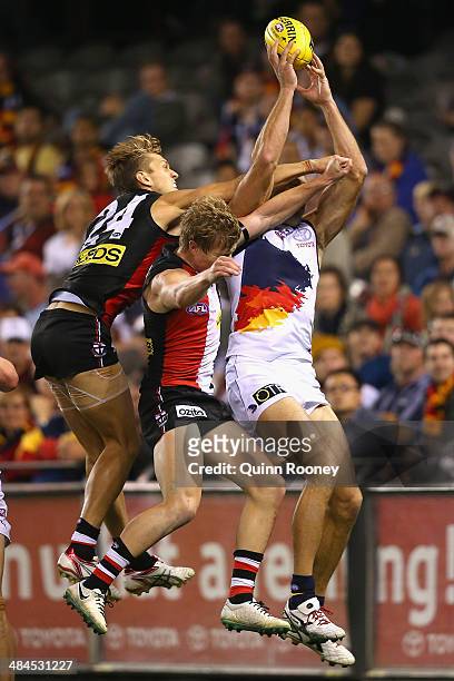 James Podsiadly of the Saints marks over the top of Sean Dempster of the Saints during the round four AFL match between the St Kilda Saints and the...