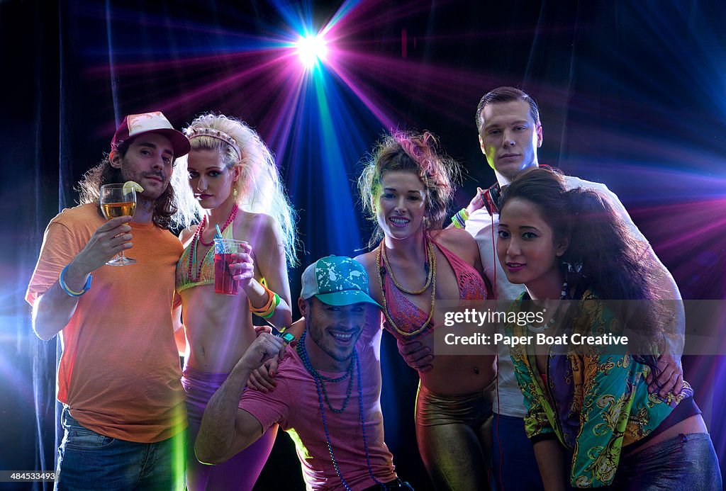 Portrait of a group of friends in a dance club