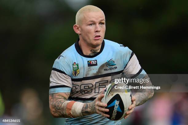 Todd Carney of the Sharks runs with the ball during the round 6 NRL match between the Manly-Warringah Sea Eagles and the Cronulla-Sutherland Sharks...