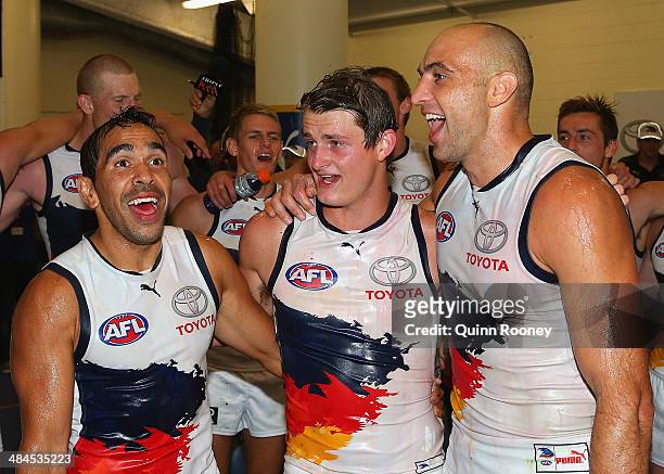 Eddie Betts, Matt Crouch and James Podsiadly of the Saints sing the song in the rooms after winning the round four AFL match between the St Kilda...