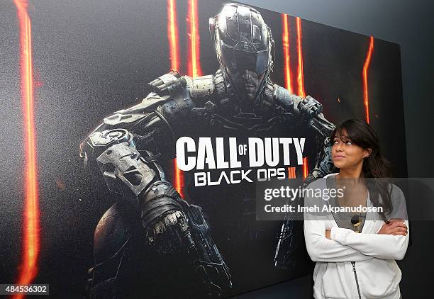 Actress Michelle Rodriguez gets hands-on with the Call Of Duty: Black Ops 3 Beta during a visit to Treyarch Studios on August 19, 2015 in Santa...