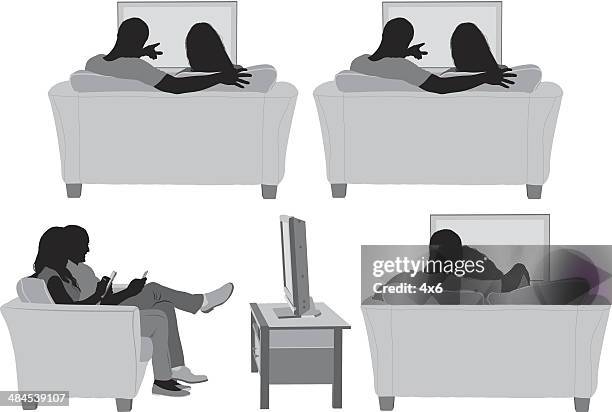 couple watching tv - couple sitting on couch stock illustrations