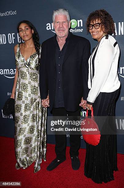 Actress Blake Perlman, actor Ron Perlman and jewelry designer Opal Stone attend the premiere of Amazon's Series "Hand of God" at Ace Theater Downtown...