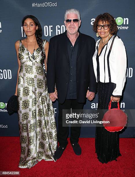 Actress Blake Perlman, actor Ron Perlman and jewelry designer Opal Stone attend the premiere of Amazon's Series "Hand of God" at Ace Theater Downtown...