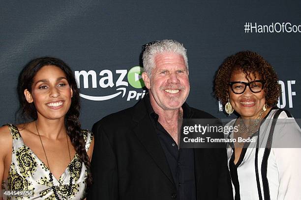 Actress Blake Perlman, actor Ron Perlman and jewelry designer Opal Stone attend the premiere of Amazon's series "Hand Of God" held at the Ace Theater...