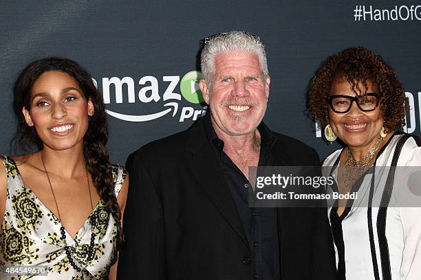 Actress Blake Perlman, actor Ron Perlman and jewelry designer Opal Stone attend the premiere of Amazon's series "Hand Of God" held at the Ace Theater...