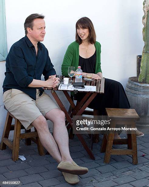 British Prime Minister David Cameron and his wife Samantha stop for a drink by a beach during their holiday on the Spanish Island of Lanzarote on...