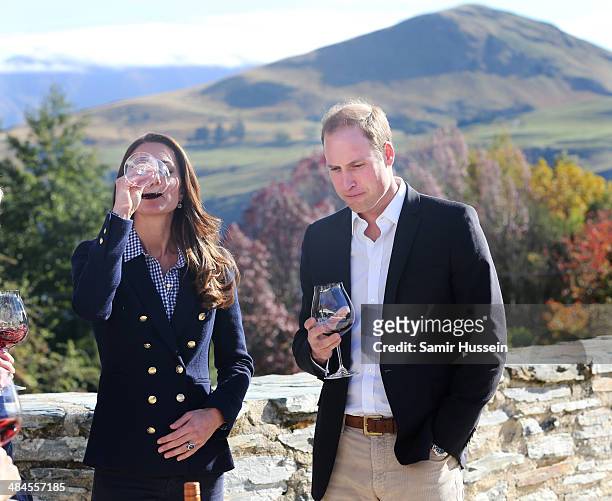 Catherine Duchess of Cambridge and Prince William, Duke of Cambridge sample red wine as the visit Otago Wines at Amisfield winery on April 13, 2014...