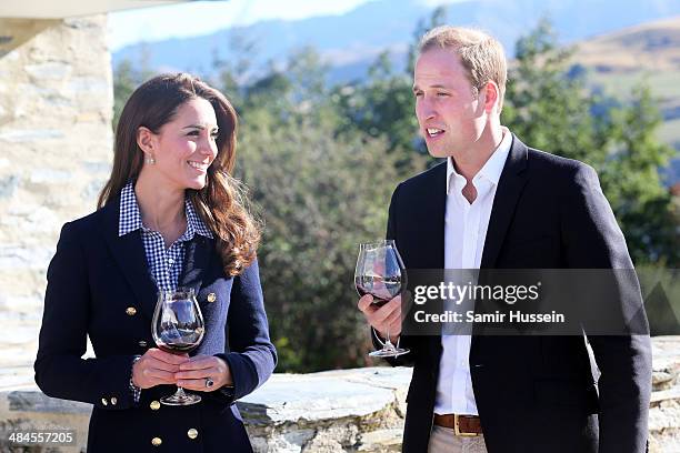 Catherine Duchess of Cambridge and Prince William, Duke of Cambridge sample red wine as the visit Otago Wines at Amisfield winery on April 13, 2014...