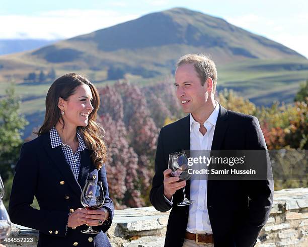 Catherine Duchess of Cambridge and Prince William, Duke of Cambridge sample red wine as the visit Otago Wines at Amisfield winery on April 13, 2014...