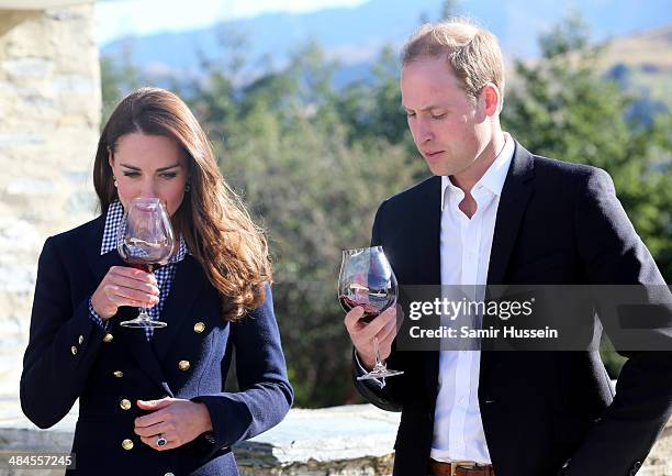 Catherine Duchess of Cambridge and Prince William, Duke of Cambridge sample red wine as the visit Otago Wines at Amisfield winery on April 13, 2014...