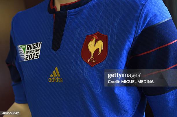 Picture shows a detail of France's new jersey for the 2015 Rugby World Cup at the Marcoussis training center, southern Paris, on August 20, 2015. AFP...