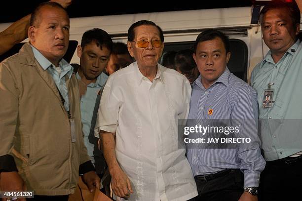 Senator Juan Ponce Enrile , formerly a defence minister and once one of the Philippines' most powerful men, arrives at a special anti-graft court to...