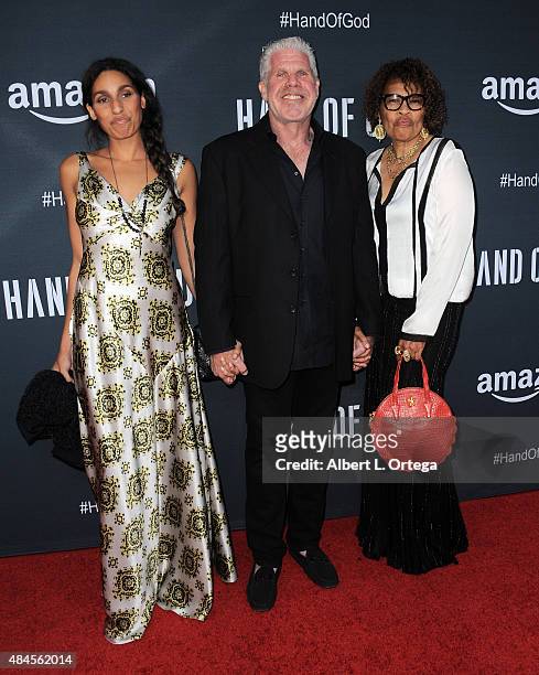 Actress Blake Perlman, actor Ron Perlman and Opal Stone arrive for the Premiere Of Amazon's Series "Hand Of God" held at Ace Theater Downtown LA on...