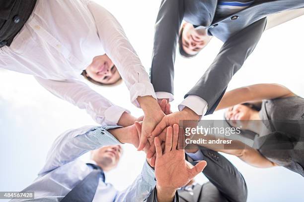 business teamwork - middelste deel stockfoto's en -beelden