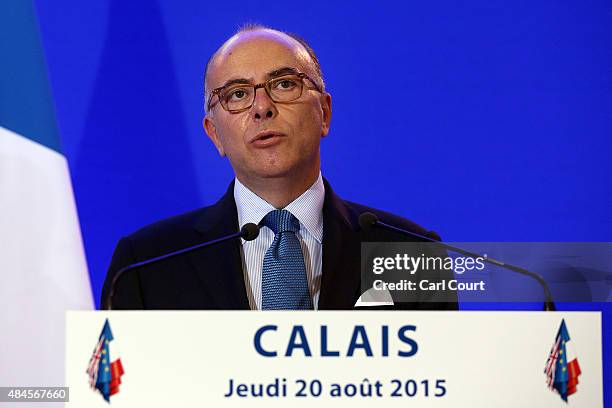 French Interior Minister Bernard Cazeneuve speaks to the media at a press conference after signing an agreement to tackle the migrant crisis in...