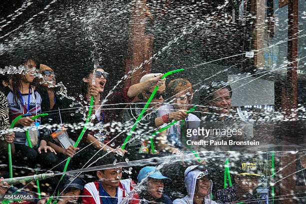 Burmese celebrate the first day of their new year water festival called Thingyan April 13, 2014 in Yangon, Myanmar. Water-throwing is the...