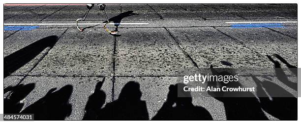 Richard Whitehead of Great Britain is applauded as he crosses Tower Bridge during the Virgin Money London Marathon on April 13, 2014 in London,...