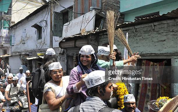 Leader Shazia Ilmi takes part during a road show to solicit votes for party candidate Anil Trivedi on April 13, 2014 in Indore, India. Shazia Ilmi...