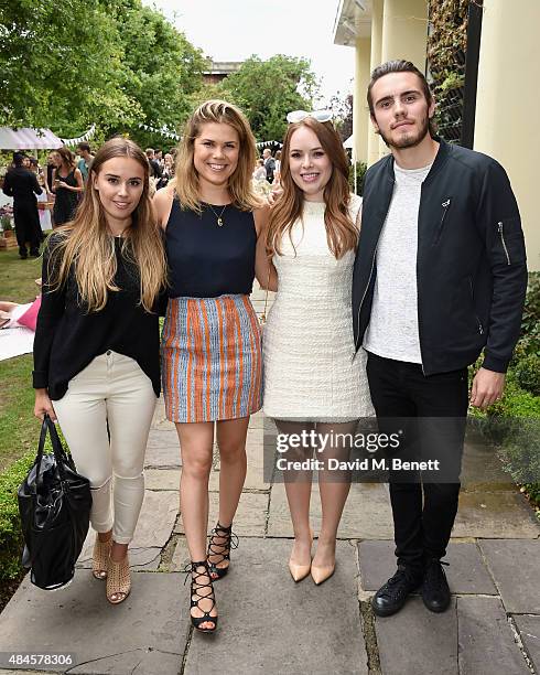 Suzie Bonaldi, Madeline Shaw, Tanya Burr and Alfie Deyes attend the Tanya Burr Cosmetics New Beauty Collection Launch Party at Kensington Roof...