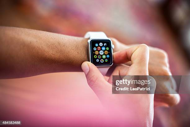 apple watch 38mm stainless steel white sport - smart watch on wrist stock pictures, royalty-free photos & images