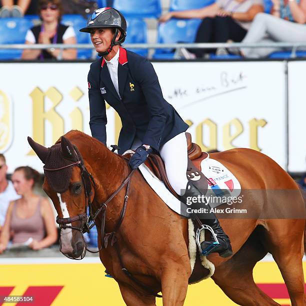 Penelope Leprevost of France competes on her horse Flora de Mariposa during the Mercedes-Benz Prize Team Show Jumping competition on Day 9 of the FEI...