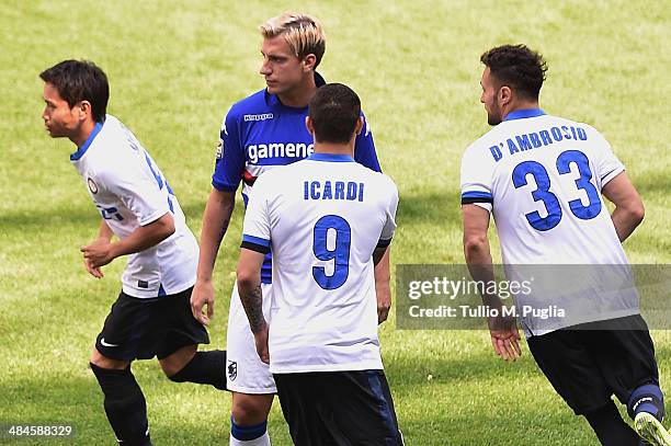 Gaston Maxi Lopez of Sampdoria looks on as Mauro Icardi of Inter tighten the hand during the Serie A match UC Sampdoria and FC Internazionale Milano...