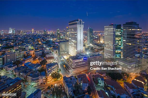 tel-aviv shalom tower dusk - tel aviv stock pictures, royalty-free photos & images