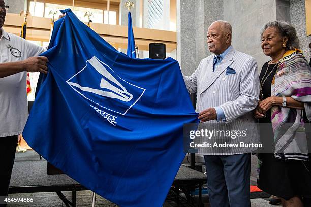 Former New York City Mayor David Dinkins and Rachel Robinson, widow of Jackie Robinson, the first black Major League Baseball player, help unveil the...