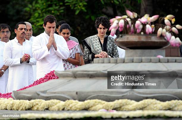 Congress Vice President Rahul Gandhi and Priyanka Gandhi along with her husband Robert Vadra and daughter Miraya, pay floral tribute to the former...