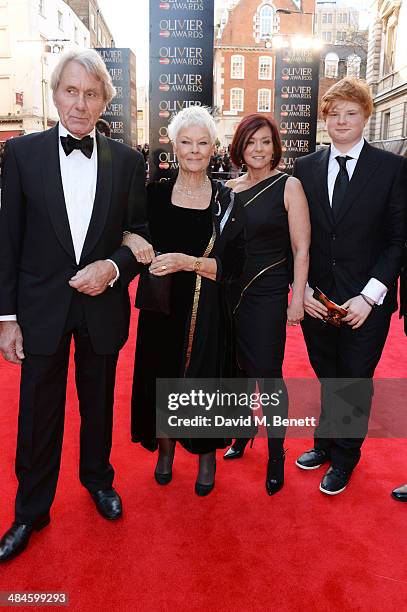 David Mills, Dame Judi Dench, Finty Williams and son Sam Williams attend the Laurence Olivier Awards at The Royal Opera House on April 13, 2014 in...