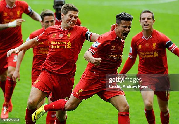 Philippe Coutinho of Liverpool celebrates his goal to make it 3-2 during the Barclays Premier League match between Liverpool and Manchester City at...