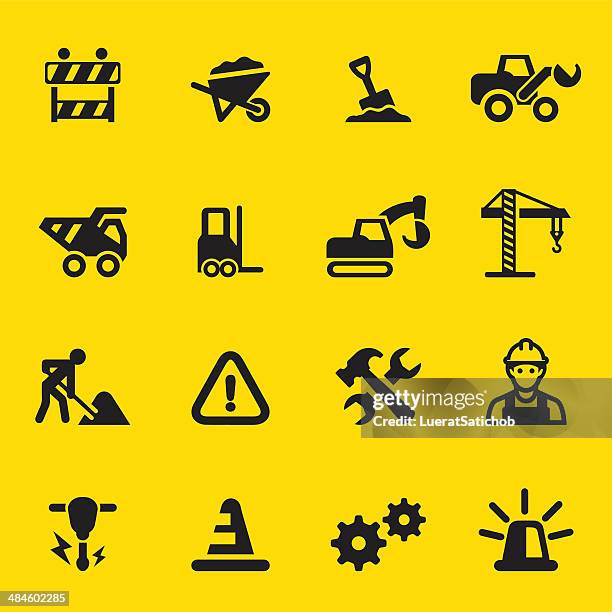 under construction yellow silhouette icons - construction vehicle stock illustrations